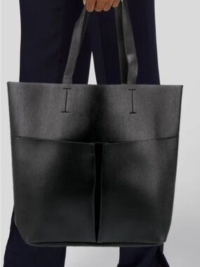 Neiman Marcus black faux leather tote bag with front pockets